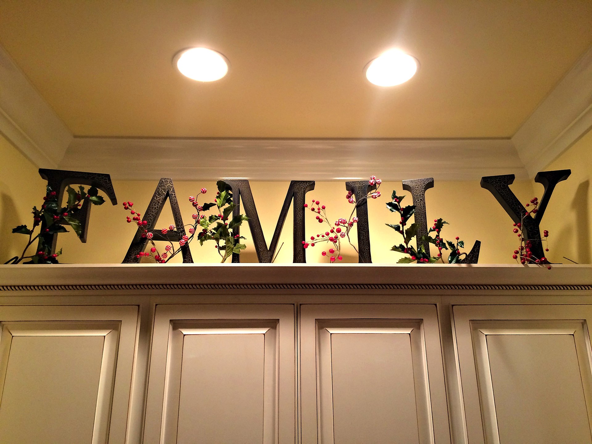Above the kitchen cabinets.